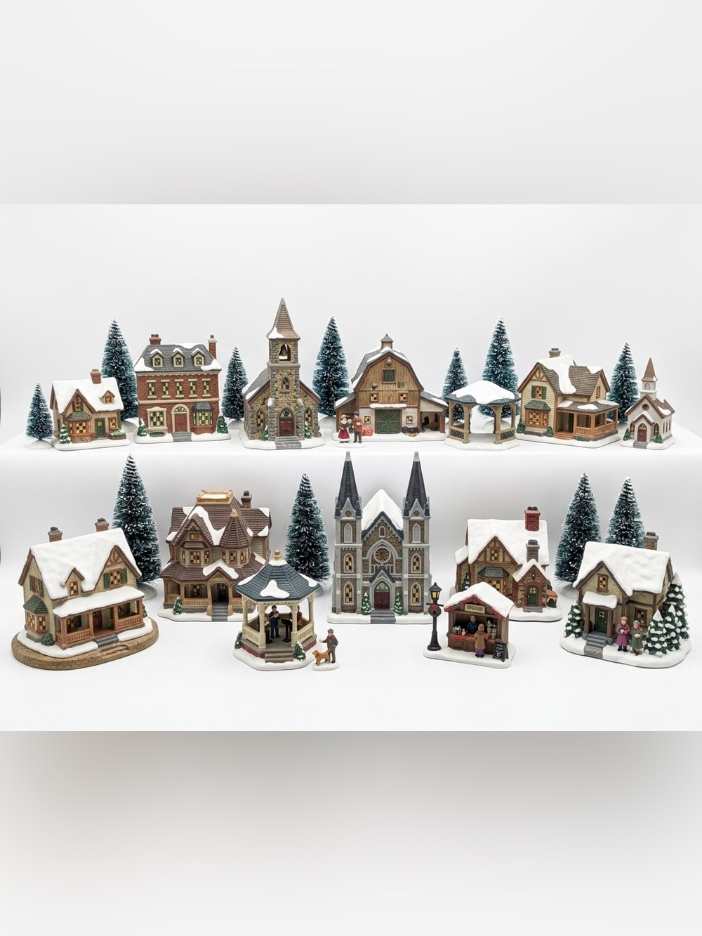 Set of 12 Thomas Kinkade Christmas Village Scenes